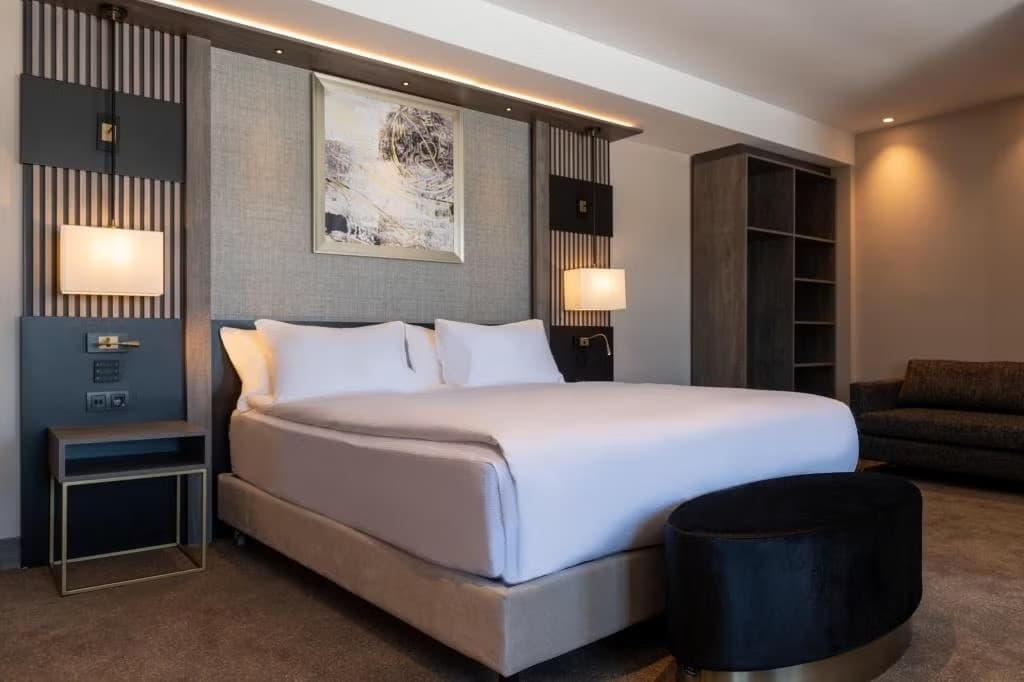 Hotel room — a large bed and a seating corner